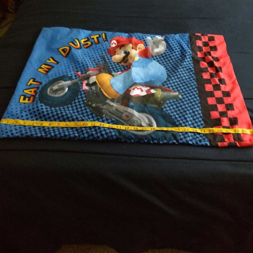 This Mario Kart Luigi Wii Pillowcase features a double-sided design with Luigi